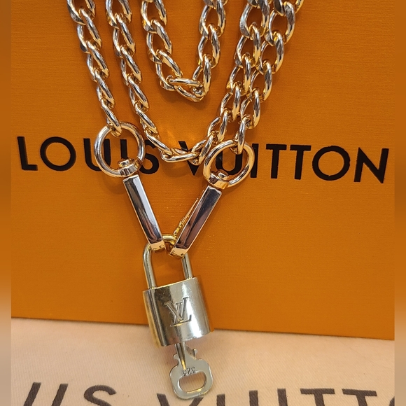 Louis Vuitton Accessories - LOUIS VUITTON #323 WITH CHAIN LOCK AND KEY AUTHENTIC!!